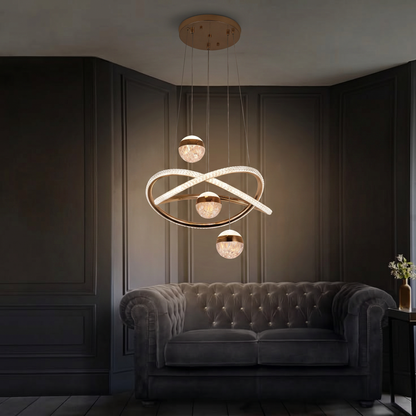 Lustre Celeste Orbit – Suspension LED Dorée avec Boucle Infinie & Design Globe en Cristal